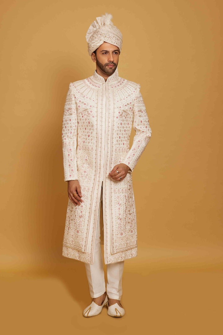 Coveted Cream Sherwani Enriched with Maroon Embroidery