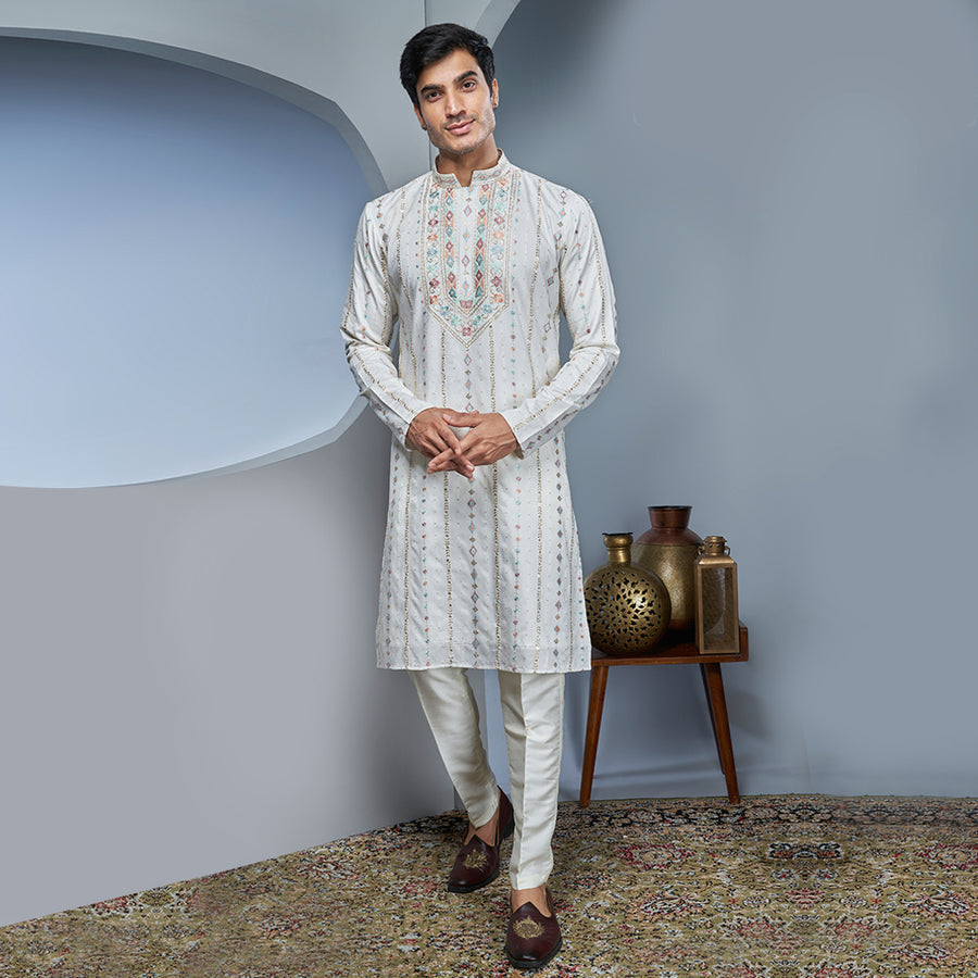 White Silk Kurta With Extensive Neckwork And Sequins